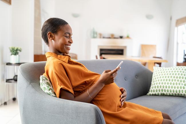 Pregnant Woman Using Smartphone